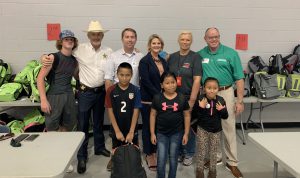 In this photo is sheriff AJ Smith (hat), state representative Jason Shoaf, and Doug Cone (green shirt). Also school superintendent Traci Moses.